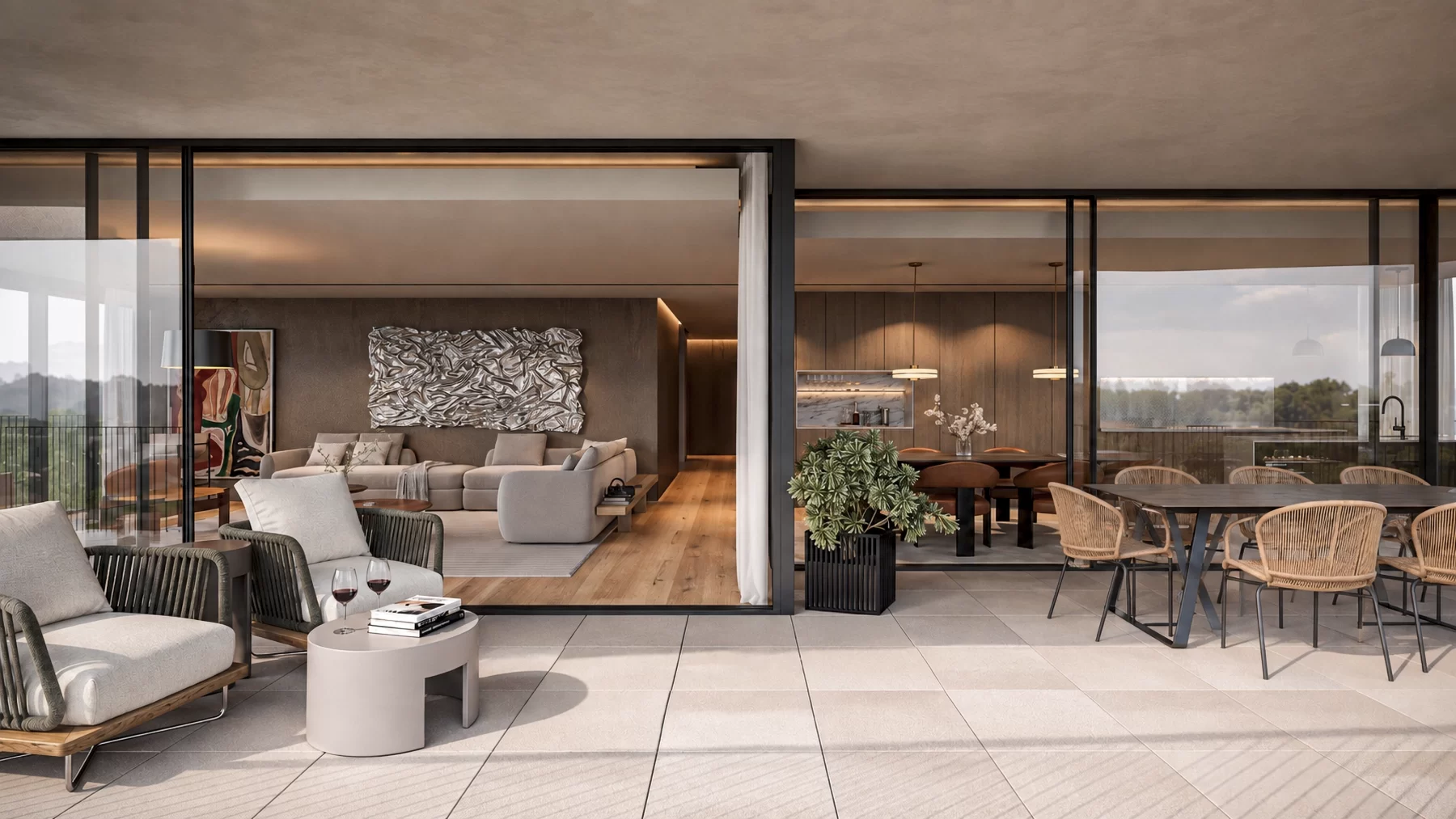 Terraço com mesa e cadeiras junto ao envidraçado